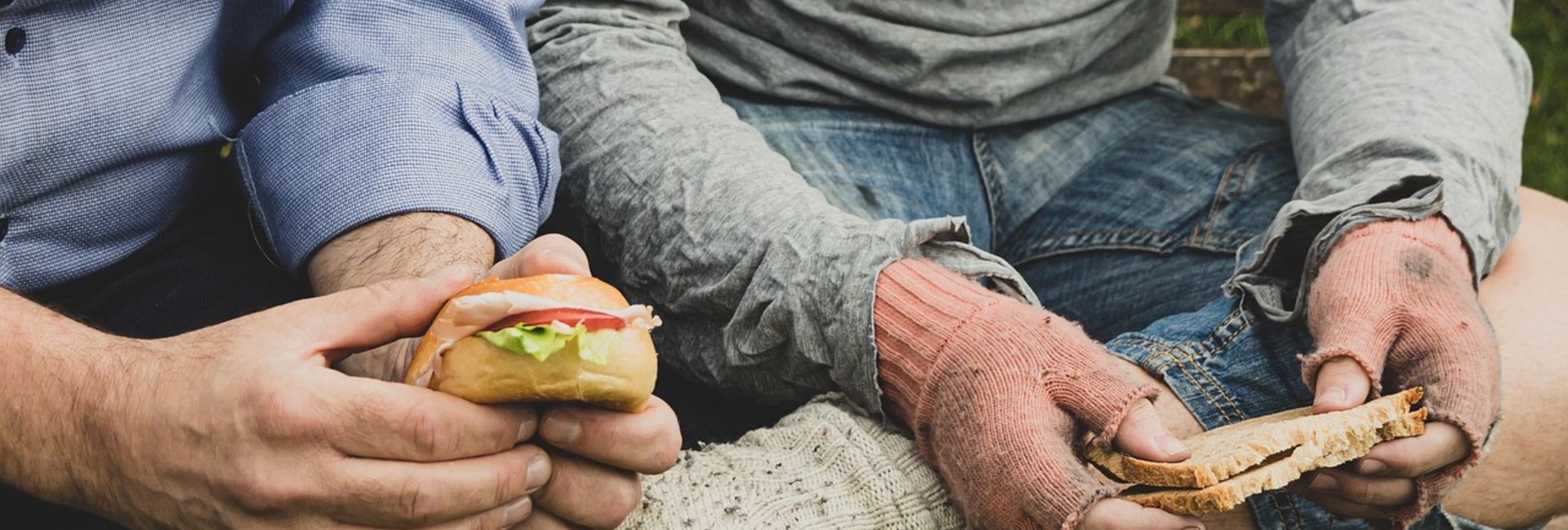 Men eating sandwiches