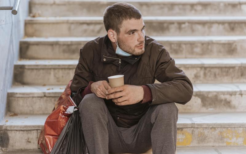 Man sitting on stairs