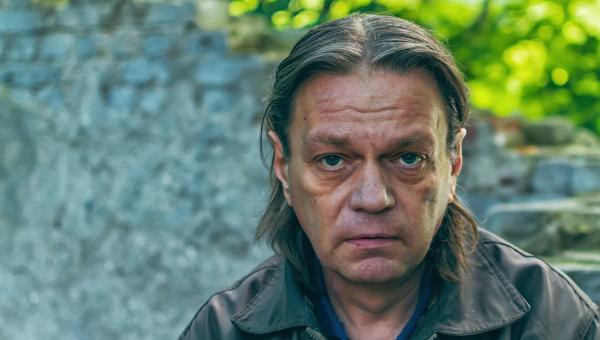 Man Smiling at Camera